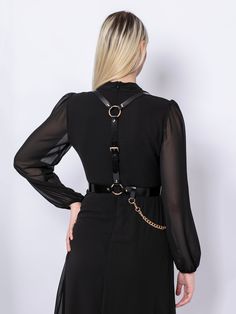 A harness designed to be timeless, the Chained Harness is handcrafted from real Italian leather.Adjustable at waist and shoulders, the piece beautifully frames the torso, creating a stylish and empowering look. With a detachable chain draping on the waist, you can style the harness over a dress, shirt or even a blazer. Waist belt width: 3 cm Adjustable using buckles at the waist and shoulders level Designed to be fitted on the waist Corset Harness, Harness Fashion, Body Harness, Brown Silver, Wide Belt, Leather Chain, A Dress, Waist Belt, Full Grain Leather