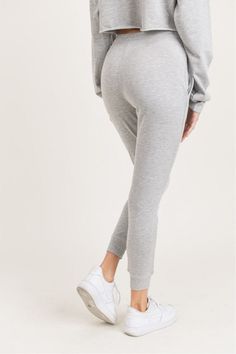 So soft, so plush, and so versatile. Take these cuffed joggers out and about (when you have the chance) or wear them inside the house. Drawstring closure. 65% polyester, 35% cotton. French terry.