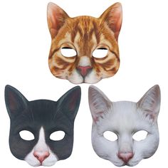 three different masks with cats'faces on them