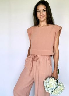 Salmon Structured Sleeve Crop Top | The Tiny Details Chic Two-piece Jumpsuit And Rompers For Spring, Chic Two-piece Jumpsuit And Romper Set For Spring, Chic Rayon Jumpsuits And Rompers For Spring, Chic Two-piece Set Tops For Vacation, Chic Two-piece Tops For Vacation, Matching Set Tops For Spring And Summer, Sleeveless Summer Tops In Matching Set, Sleeveless Two-piece Set Tops For Summer, Sleeveless Two-piece Summer Tops