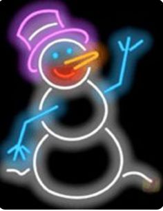 a neon snowman is standing in the dark