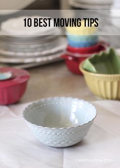 the words 10 best moving tips in front of bowls and plates on top of a table