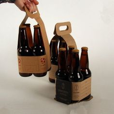 a person holding a bottle opener in front of several empty beer bottles on a white background