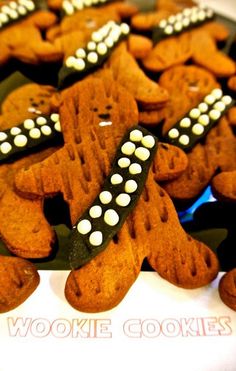 some cookies are decorated with black and white polka dots