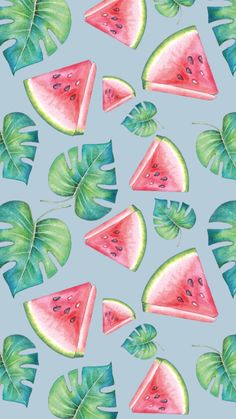 watermelon slices and green leaves on a blue background with a pattern in the middle