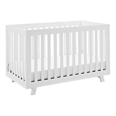 a white crib is shown against a white background