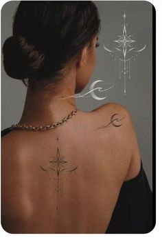 a woman with a cross tattoo on her back