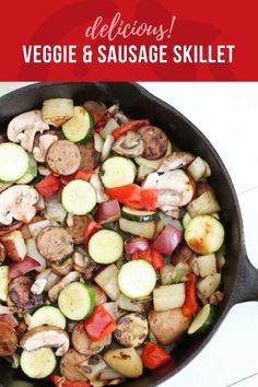 a skillet filled with vegetables and meat