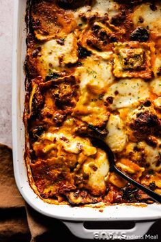 a casserole dish with meat and cheese