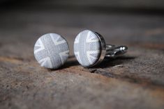 These subtle grey union jack cufflinks create the alternative to the classic red white and blue. These cufflinks are set on a shiny silver setting and measure 2cm across. They are subtle and stunning. You will receive them in a cufflink box and gift wrapped. 3rd Wedding Anniversary, Cufflink Box, Wedding Bottles, 3rd Anniversary Gifts, Leather Coasters, Personalized Anniversary Gifts, Stocking Filler Gifts, Tie Clips, Personalized Anniversary