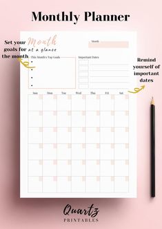 the printable planner is on top of a pink table with a pencil and pen