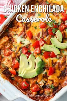 chicken enchilada casserole with avocado and tomatoes