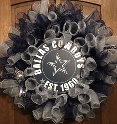 a wreath with the cowboys logo on it