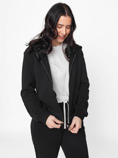 Classics are classic for a reason, and our Classic Zip Hoodie lives up to its name. The Classic Zip Hoodie combines lightweight softness + our beloved full-zip style to create the ultimate comfy basic. Pair it with the Classic Sweatpant for maximum comfort + style! Color: Black Full zipper Hood Functional front pockets Rollable + cinched wrist cuffs Ribbed cuffs + bottom hem Signature “Little Bipsy” side tag Material + Wash: 86.7% cotton | 13.3% polyester Machine wash gentle with like colors Dry Basic Everyday Hooded Hoodie, Basic Everyday Hoodie, Everyday Cozy Fit Hoodie With Double-lined Hood, Basic Everyday Hoodie With Double-lined Hood, Urban Style Solid Color Fleece Hooded Jacket, Everyday Hoodie With Double-lined Hood, Everyday Fleece Hooded Jacket With Ribbed Cuffs, Everyday Fleece Sweats With Double-lined Hood, Everyday Hooded Jacket With Double-lined Hood