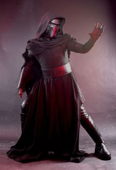 a man dressed as darth vader in costume