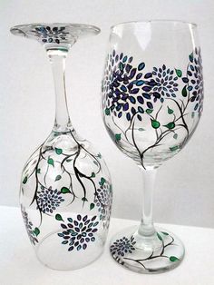 two wine glasses sitting next to each other