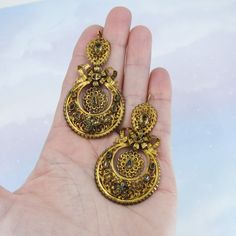 "These earrings are beyond exquisite, BEYOND. I encourage you to zoom way in on the pics and look at the absolutely incredible metal work on these beauties, it is phenomenal. Made circa 1850, very possibly earlier, these earrings are done in the pendeloque style popularized in the mid-1700's. Bezel set foil-backed citrines sit atop hand sawn scrolling metalwork that is full of fine detail. And as if things couldn't get any better, these are also day/night! And they're not just day/night with two Antique Gold Victorian Earrings For Formal Events, Victorian Antique Gold Earrings For Formal Occasions, Antique Gold Victorian Earrings For Formal Occasions, Ornate Pierced Danglers For Wedding, Gold Earrings With Historical Design For Formal Occasions, Antique Gold Chandelier Earrings, Ornate Gold Earrings For Ceremonial Occasions, Victorian Chandelier Earrings For Formal Occasions, Gold Earrings With Historical Design For Gift