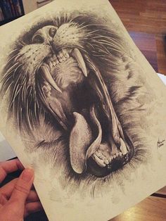 a drawing of a lion with its mouth open