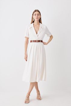 An Ode To Sophistication And Timeless Design, Soft Tailoring Immerses This Dress With Short Sleeves, A Notched Collar And Waist Belt Adding Touches Of Refinement Above And A Graceful Skirt That Flows To A Midaxi Hemline Below. Perfect For Emanating Poise At Professional Events And Special Occasions Alike.Soft Tailoringshort Sleevednotched Collar And Waist Belt One Piece Dress With Belt, Belt On Waist Outfit, Wear A Belt With A Dress, Professional Summer Dresses, Waist Belt Outfit Dress, Necklines For Broad Shoulders, Summer Work Dresses Office Wear, Belt Styling, Soft Summer Dress