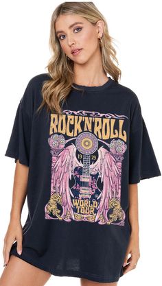 Our "Rock and Roll Tee" is a black t-shirt that that says "rock and roll" in yellow on the front. It has a guitar design on it. These are an oversized fit. Trendy Band Logo T-shirt For Concerts, Edgy Slogan T-shirt For Concert, Rock And Roll Graphic Design Short Sleeve Tops, Black Cotton Rock And Roll T-shirt, Rock Style Crew Neck T-shirt For Music Festival, Black Casual T-shirt For Music Festivals, Casual Black T-shirt For Music Festivals, Rock Band Logo T-shirt Relaxed Fit, Rock Band Logo T-shirt In Relaxed Fit