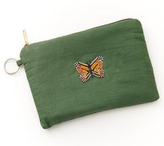 Part of Matr Boomie's Bala Mani Collection, this cosmetics pouch offers stylish and functional safekeeping of money, cards, makeup, keepsakes, and tech accessories -- to name a few! Artisans use traditional hand-beading techniques to create the modern butterfly, a symbol of transformation and a timeless, classic motif loved by many. From Matr Boomie. Portable Pouch Pencil Case As Gift, Daily Use Rectangular Pouch With Card Slots, Handheld Clutch As Gift, Rectangular Clutch With Removable Pouch As Gift, Portable Handheld Clutch As Gift, Rectangular Zipper Pouch Cosmetic Bag For Daily Use, Zipper Pouch Cosmetic Clutch, Personal Use Cosmetic Clutch Bag With Zipper, Cosmetic Clutch Bag With Zipper For Personal Use