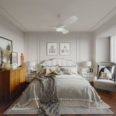 a bedroom with white walls and wooden floors