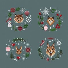 four cross stitch christmas ornaments with foxes and holly wreaths in the middle, on a gray background