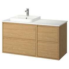 a bathroom vanity with two drawers and a white sink top on the left hand side