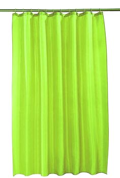 a green shower curtain hanging on a metal rod