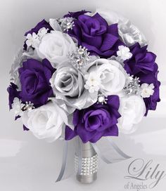 the bridal bouquet is purple and white with silver accents on it's side