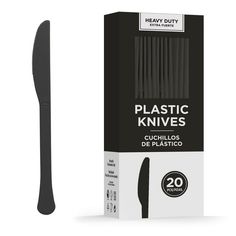 a black plastic knife is in the packaging