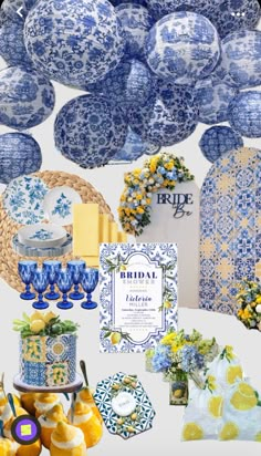 blue and white wedding theme with lemons, flowers, plates, vases and napkins