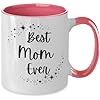 a white and pink coffee mug with the words best mom ever