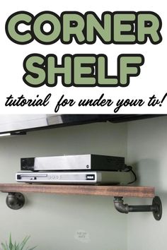 the corner shelf is made out of wood and has metal pipes on it, along with a remote control for under your tv