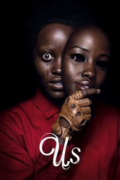 the poster for us shows two women with gloves on their hands and one is wearing a red shirt