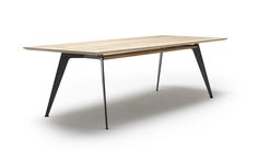 a wooden table with black legs on an isolated white background