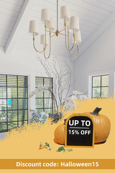 a large pumpkin sitting on top of a table next to a sign that says up to 15 % off