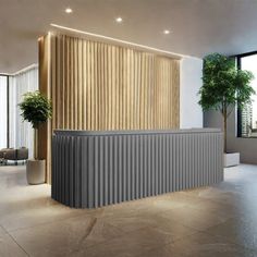 an office lobby with large windows and wooden slats on the wall, along with potted plants