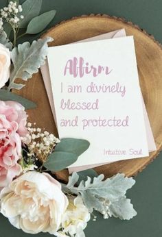 a card that says, i am divinely dressed and protected with flowers on it