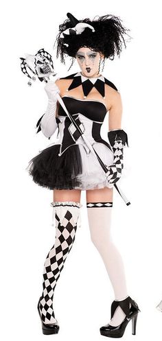 a woman dressed in a black and white costume