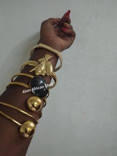 This is adjustable unisex bracelet measuring approximatly 3 inches diameter which is bendable to fit small and large wrists. Unique Gold Metal Bangle, Gold Adjustable Cuff Bracelet, Adjustable Gold Brass Bangle, Afro Jewelry, Heart Accessories, Custom Bling, Brass Bracelet, Unisex Bracelets, African Jewelry