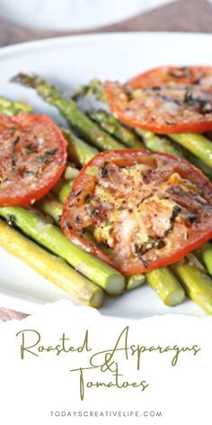 roasted asparagus and tomatoes on a white plate with the words roasted asparagus tomatoes