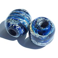 We are in process of updating our beads to a new look. Introducing new colors and more size options as well. Please feel free to reach out to us with any questions you may have This unique bead is created by mixing the ashes with molten borosilicate glass to form this swirling beauty of a glass Remembrance bead that you can wear close to your heart. Each bead is specially hand crafted for you, making it a very unique and truly one-of-a-kind memorial cremation jewelry necklace. Increase your savi Gift Recycled Glass Beads, Gift Recycled Glass Round Beads, Spiritual Recycled Glass Beads For Gifts, Recycled Glass Round Beads Jewelry For Gifts, Recycled Glass Round Beads Jewelry Gift, Recycled Glass Jewelry With Spacer Beads As Gift, Recycled Glass Spacer Beads Jewelry As Gift, 8mm Glass Beads For Gifts, Glass Beads Gift