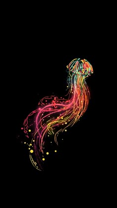 a colorful jellyfish floating in the air on a black background with yellow and red lights