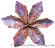 an origami flower made out of money