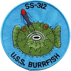 a patch with an image of a fish on it's face and the words uss burfish