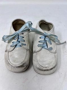 Cute little 1950's white leather baby shoes with blue shoelaces. They show age and wear as can be seen in the photos. Would be cute to use as display or for doll shoes. Leather Baby Shoes, Leather Baby, Shoes Lace, Doll Shoes, Vintage 1950s, White Leather, Halloween Shopping, Shoe Laces, Baby Shoes