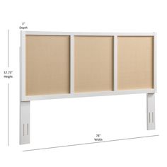 a white headboard with three panels and measurements