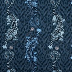 a blue and white tiger pattern on a black background, with two smaller tigers in the foreground