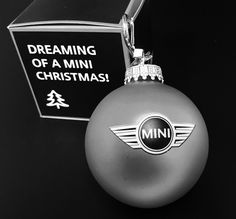 a mini christmas ornament is shown in black and white